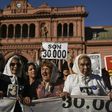 Members of the Argentine human rights group "Madres de Plaza de Mayo" rally in front of the presidential palace in Buenos Aires to mark the 40th anniversary of their first protest demanding answers about kin who went missing during military rule