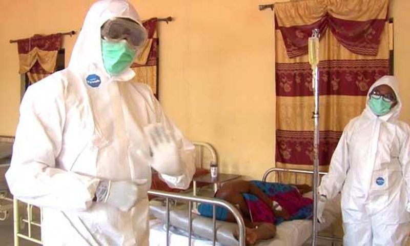 Health workers attending to a Lassa patient