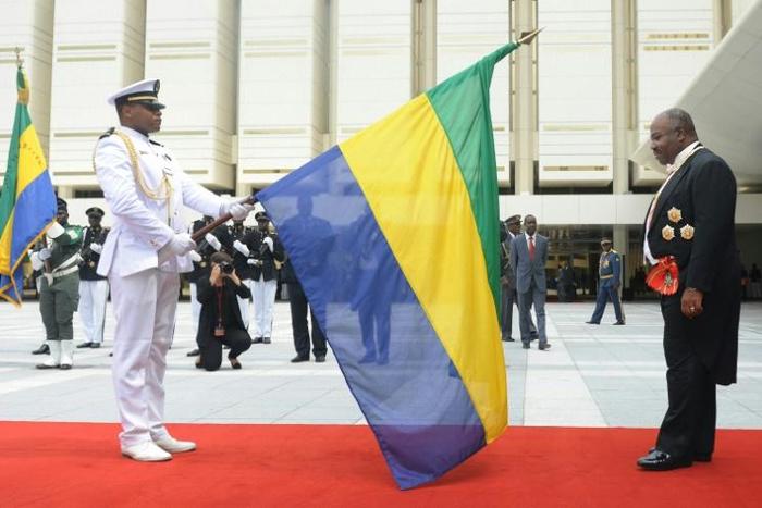 Gabon's president Ali Bongo (R), who took over from his father in 2009, has been absent since October when he suffered a stroke in Saudi Arabia