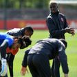 Manchester United's midfielder Paul Pogba (R) attends a team training session on May 3, 2017