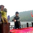 A Chinese monkey described as the "king of prophets" tips Donald Trump for the US presidency at a park in Changsha, in China's Hunan province, on November 3, 2016