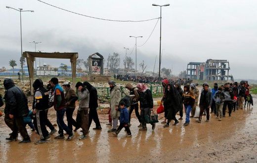 Families fleeing the fighting in Mosul, northern Iraq pictured on March 23, 2017