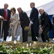 Top US diplomat and China scholar Richard Solomon, pictured (L) at a ground breaking ceremony with president George W. Bush (C)in 2008, has died aged 79