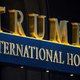 A man armed with a semi-automatic rifle is arrested at the Trump International Hotel