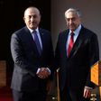 Turkish Cypriot leader Mustafa Akinci (right) holds a press conference with Turkish Foreign Minister Mevlut Cavusoglu after a meeting in the self-proclaimed Turkish Republic of Northern Cyprus (TRNC) on February 21, 2017