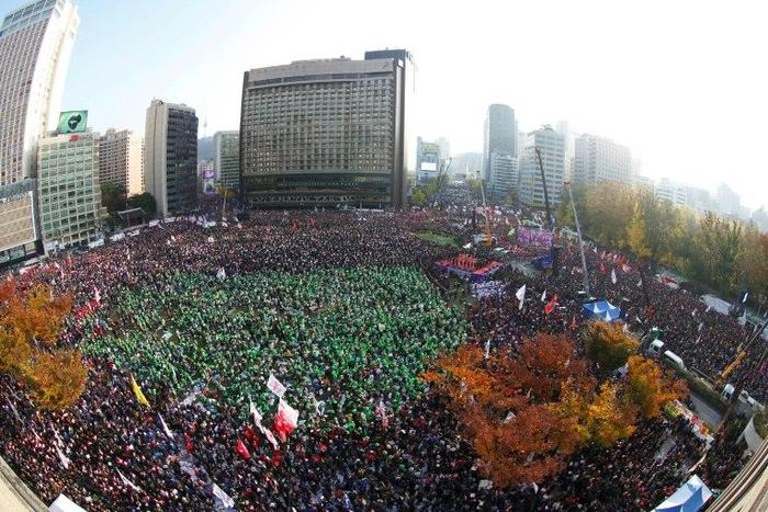 Demonstrators attend a protest against South Korean President Park Geun-Hye in Seoul on November 12, 2016