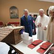 Pope Francis (C) exchanges gifts with Britain's Prince Charles and his wife Camilla, Duchess of Cornwall during a private audience on April 4, 2017 at the Vatican