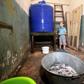 Sasha, 10, stands in a bomb shelter in Donetsk, eastern Ukraine, on September 19, 2016, where he hides with his mother Elena