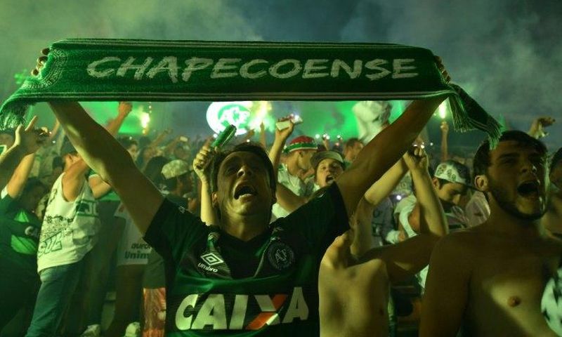 Fans of Brazilian club side Chapecoense pay tribute to players killed in a plane crash in November 2016