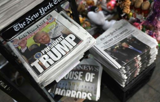 Front pages from New York City newspapers feature President-elect Donald Trump, on November 9, 2016