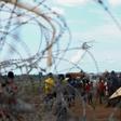 A UN helicopter flies over the newly formed camp for internally displaced people, in Kaga Bandoro, on October 18, 2016
