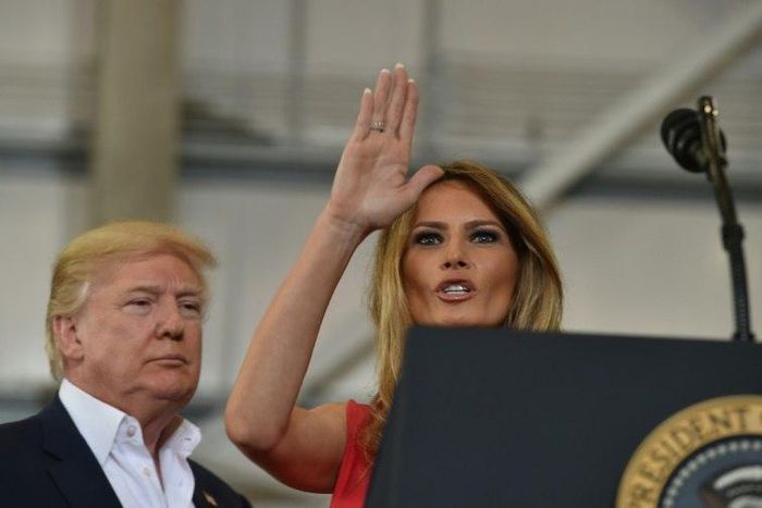 US President Donald Trump and First Lady Melania Trump arrive for a rally on February 18, 2017 in Melbourne, Florida