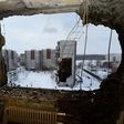 This file photo taken on December 1, 2014 shows destroyed buildings in the eastern Ukrainian city of Donetsk. The UN's top court will on April 19 rule on a bid by Kiev to halt Russia's alleged funnelling of arms and personnel into Ukraine's war-torn ea...