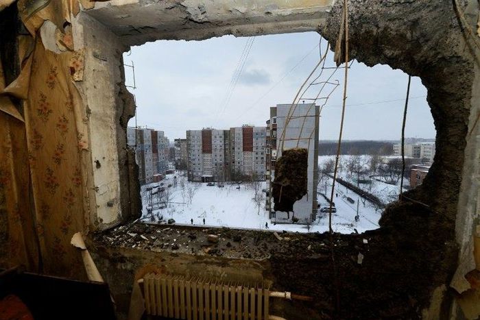This file photo taken on December 1, 2014 shows destroyed buildings in the eastern Ukrainian city of Donetsk. The UN's top court will on April 19 rule on a bid by Kiev to halt Russia's alleged funnelling of arms and personnel into Ukraine's war-torn ea...
