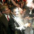 French presidential election candidate for the right-wing Les Republicains (LR) party Francois Fillon (C) reacting as a man throw flour at him on April 6, 2017 during a political rally in Strasbourg, northeastern France