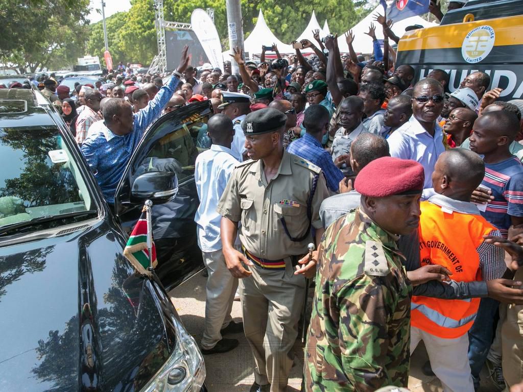 President Uhuru Kenyatta waves at a crowd during a past tour (Twitter)