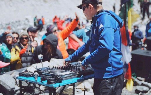 British DJ Paul Oakenfold plays a set to mountaineers and trekkers at Mount Everest base camp on April 11, 2017