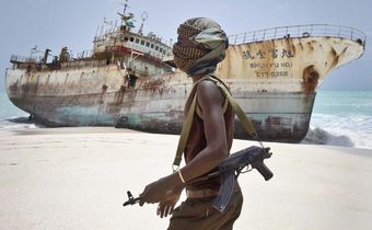 Somali pirate at shore.