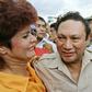 Panamanian dictator Manuel Antonio Noriega hugs supporters on a visit to a remote town in June 1987
