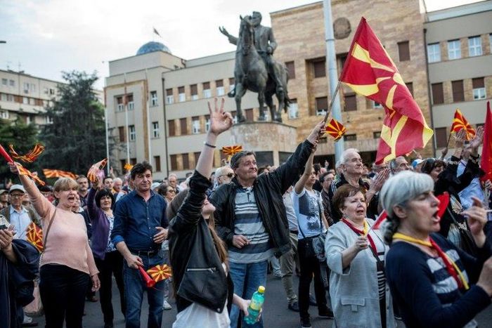 Protesters demonstrate in front of the Parliament building in Skopje on May 2, 2017, a few days after violence erupted after nationalist protesters stormed the building in anger over a vote for a new speaker
