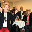 Karin Prien (R) and members of the Conservative Christian Democrats (CDU) party react to election results in Schleswig-Holstein state elections in Kiel, northern Germany, on May 7, 2017