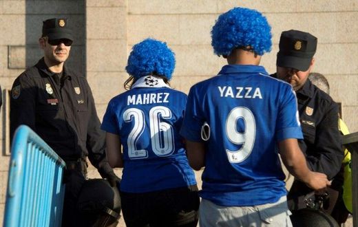 Spanish police quiz Leicester City supporters before the Champions League quarter-final first leg match against Atletico Madrid at the Vicente Calderon stadium on April 12, 2017