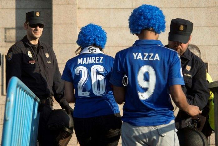 Spanish police quiz Leicester City supporters before the Champions League quarter-final first leg match against Atletico Madrid at the Vicente Calderon stadium on April 12, 2017