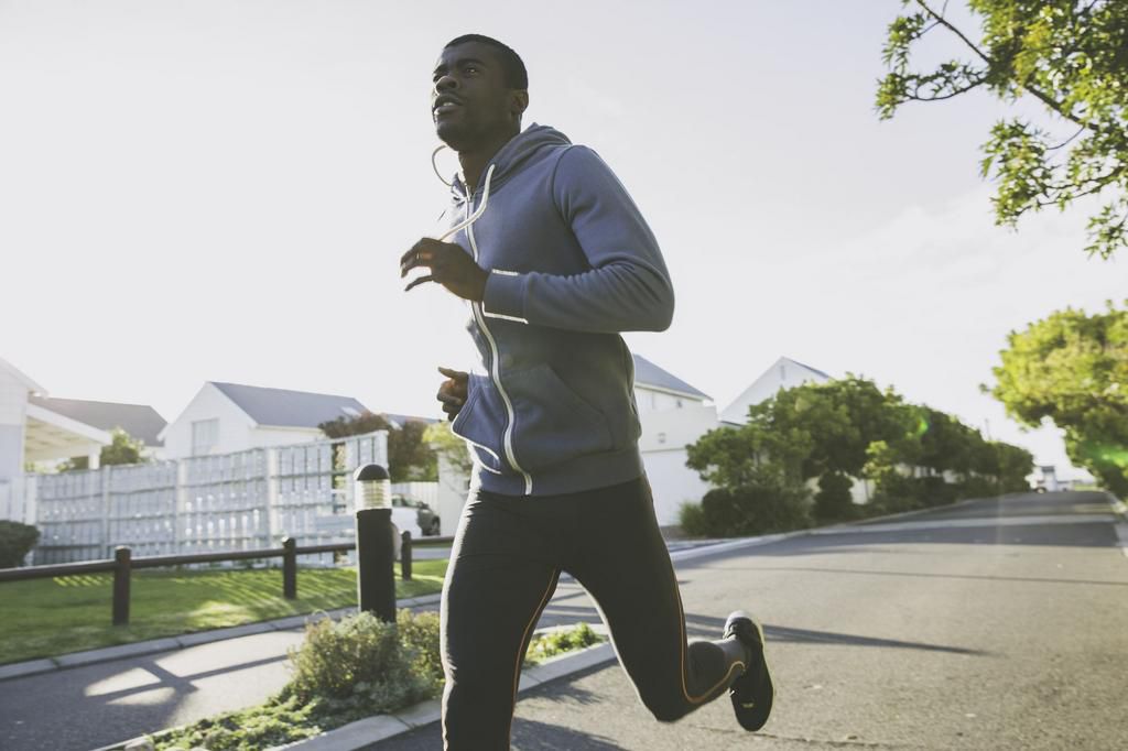 Man in residential area jogging