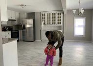 Jose Chameleone's wife in their new house in US