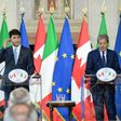 Italy's Paolo Gentiloni (right) said the importance of transatlantic ties should not lead Europe to renounce 'fundamental principles such as our commitments against climate change'
