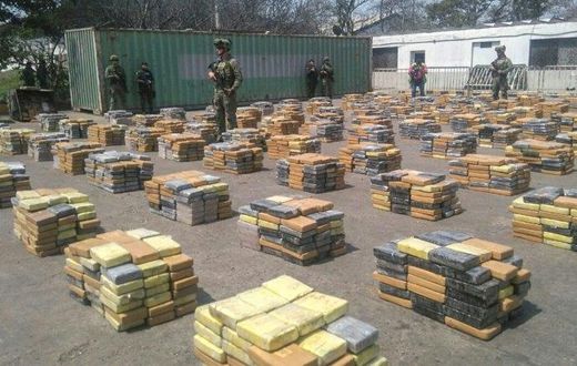 This handout picture released by the Colombian Antinarcotics Police shows 6,184 kilos of cocaine -which was heading to the port of Algeciras, Spain- seized in Barranquilla, on April 2, 2017