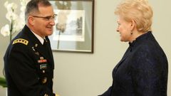 Lithuania's President Dalia Grybauskaite (R) shakes hand with Curtis Michael Scaparrotti, a four-star general in the US Army and Supreme Allied Commander Europe of NATO Allied Command Operations, during an official meeting in Vilnius on March 16, 2017