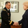 Lithuania's President Dalia Grybauskaite (R) shakes hand with Curtis Michael Scaparrotti, a four-star general in the US Army and Supreme Allied Commander Europe of NATO Allied Command Operations, during an official meeting in Vilnius on March 16, 2017