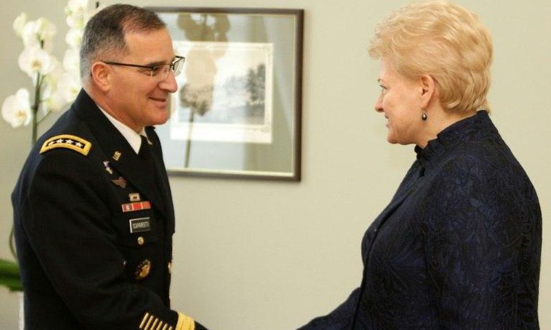 Lithuania's President Dalia Grybauskaite (R) shakes hand with Curtis Michael Scaparrotti, a four-star general in the US Army and Supreme Allied Commander Europe of NATO Allied Command Operations, during an official meeting in Vilnius on March 16, 2017