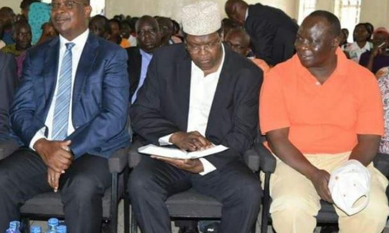 Nairobi Governor Evans Kidero (left), Miguna Miguna (centre) and Reuben Ndolo at the SDA Church, Jericho, Nairobi.