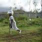 Sara, 66, receives food from the World Food Programme in the commune of Maniche, in Haiti, last month