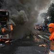 Buses were torched as Brazilian anti-austerity protesters clashed with riot police in Rio de Janeiro, on February 1, 2017