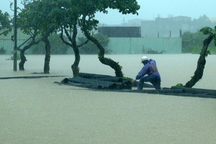 Water surged into cars, homes and businesses after 600 millimetres of rain fell in under 11 hours in some areas