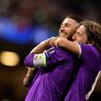 Real Madrid's Sergio Ramos (L) and Luka Modric celebrate after Real score their fourth goal during the UEFA Champions League final football match against Juventus in Cardiff on June 3, 2017