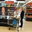 Medical workers take blood pressure and talk with shoppers about healthy eating choices as part of the "Shop with a Doc" program at a Ralph's Supermarket in Irvine, California