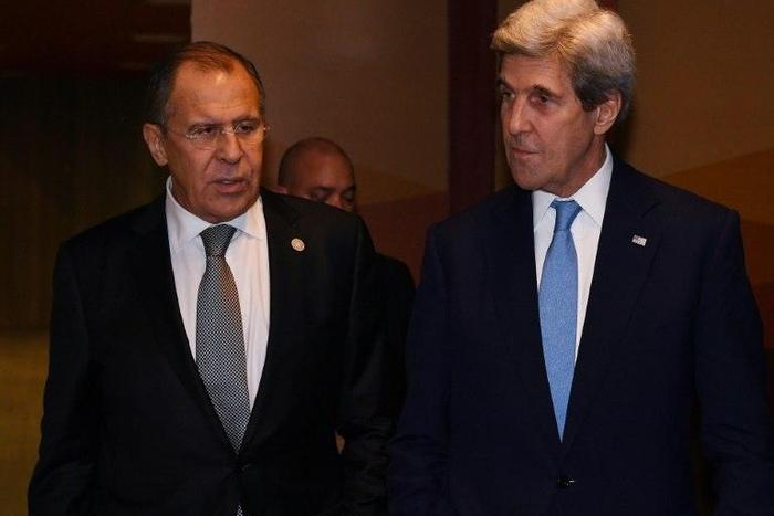 Russian Foreign Minister Sergey Lavrov (L) and US Secretary of State John Kerry, seen in November 2016, met in Germany December 7, 2016