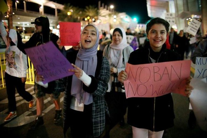 Protesters demonstrate against the US travel ban during a rally at San Diego International Airport on March 6, 2017