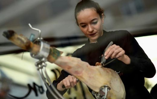 Spanish ham cutter Raquel Acosta shows her skills as more women enter the man's world of high-level cutters of Spain's famous dry-cured ham legs