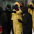 Malaysian police sealed off large areas of Kuala Lumpur International Airport to sweep for traces of the nerve agent VX
