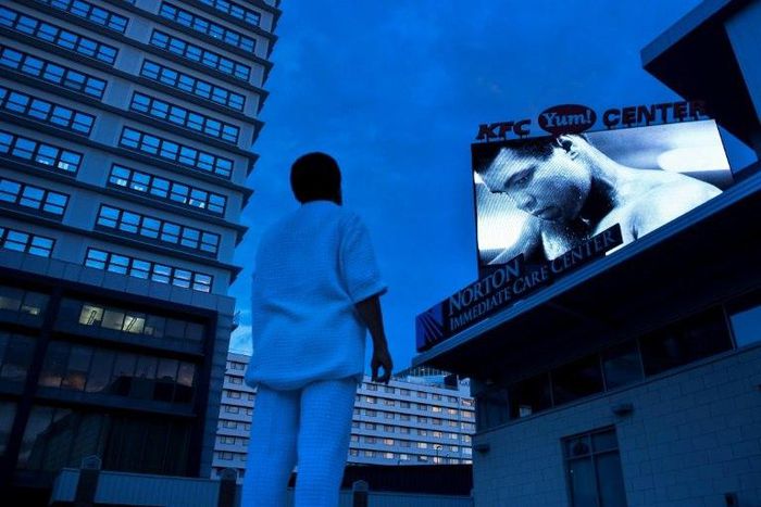 A son of boxing legend Muhammad Ali (screen) and his mother Khalilah Camacho-Ali were held for questioning at a Florida airport because of their Arabic-sounding names