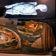 A young visitor looks at a 3D image of a CT scan of an Egyptian mummy, during a preview for a joint British-Australian exhibition in Sydney
