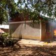 One of the houses on fire after angry residents stormed a police station after suspect’s controversial death in cell