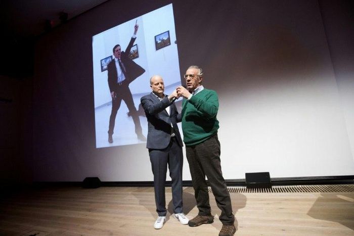 Winner of the World Press Photo 2016, photographer Burhan Ozbilici (R), with Managing Director of the World Press Photo Foundation Lars Boering during the announcement of the World Press Photo prizes in Amsterdam, on February 13, 2017