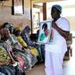 Blandine Mekpo, a midwife at a maternity ward, provides information about AIDS to pregnant women in Bohicon, southern Benin