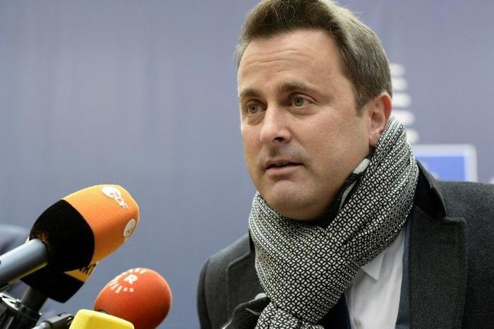 Luxembourg Prime Minister Xavier Bettel addresses journalists at an EU leaders summit in Brussels on October 20, 2016